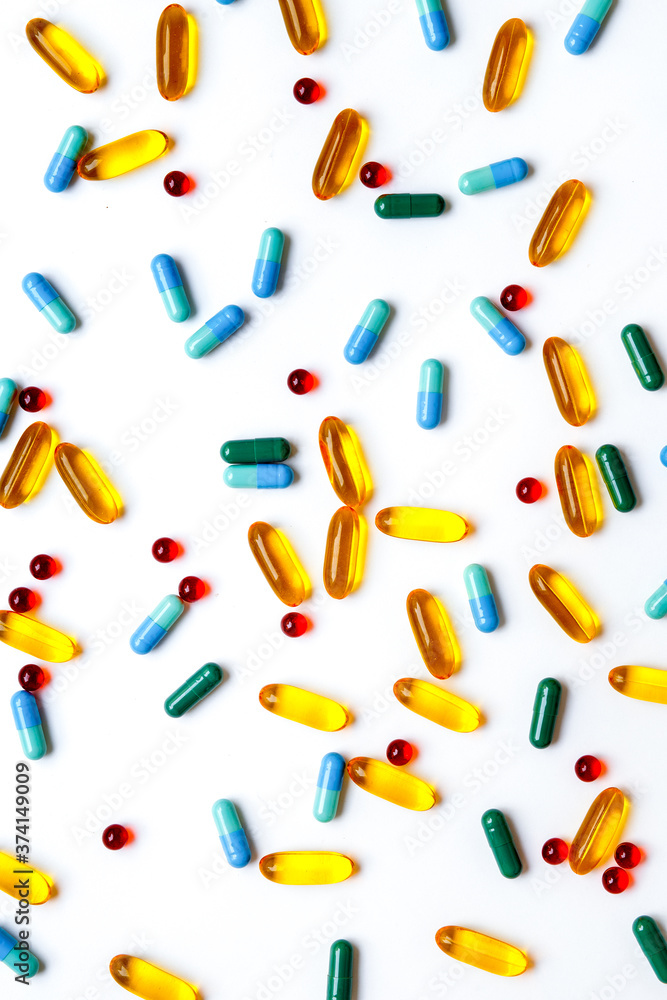 colorful medical pills isolated on white background colorful medical pills isolated on white background