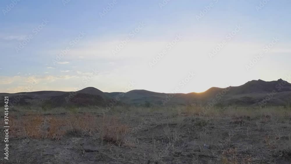 Dawn time lapse. Dawn in the steppe over the mountains. Dawn time lapse. Dawn in the steppe over the mountains.