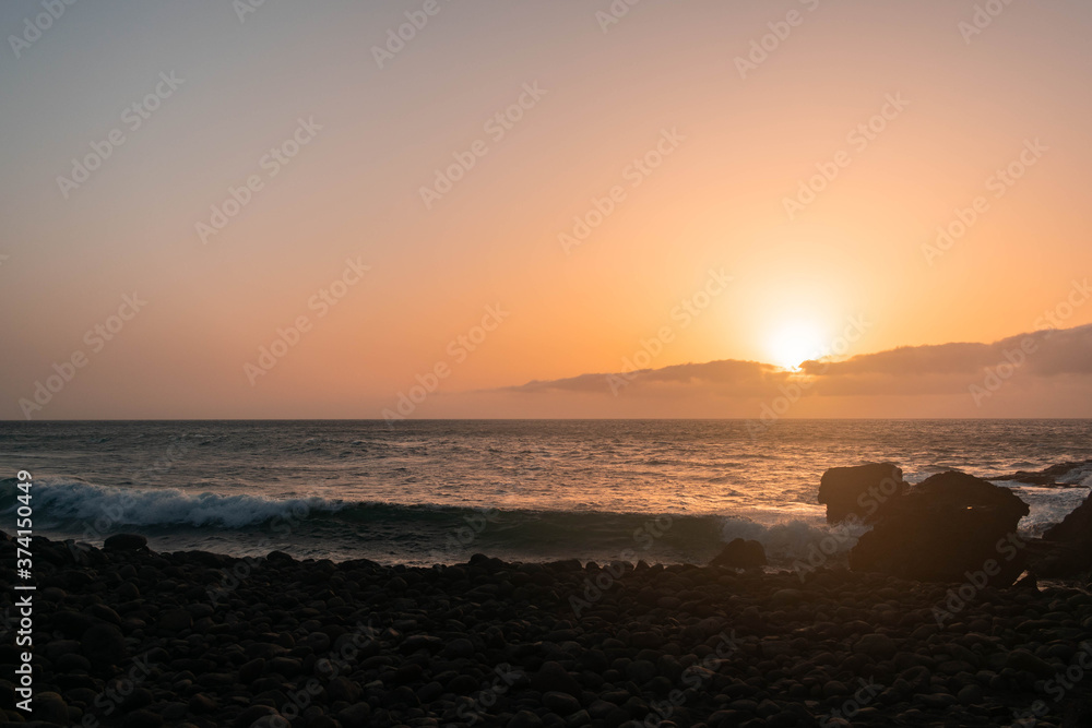 sunset in hidden stone beach in Gran Canaria
