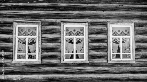 Traditional Russian carved wooden windows in an old house