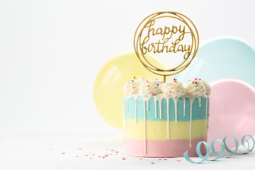 Pastel drip birthday cake
