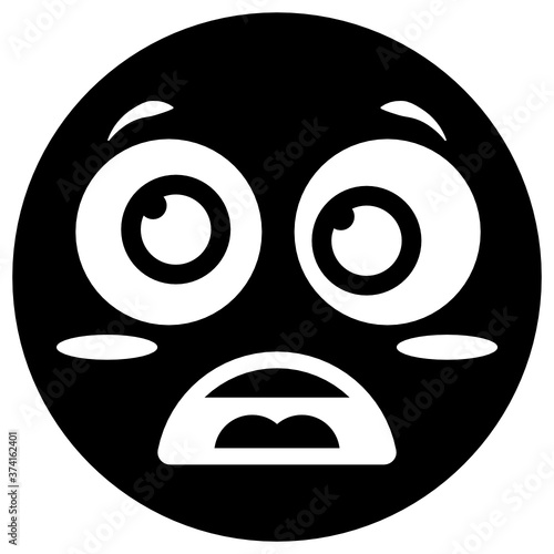 
A solid vector design of astonished emoticon in solid style 

