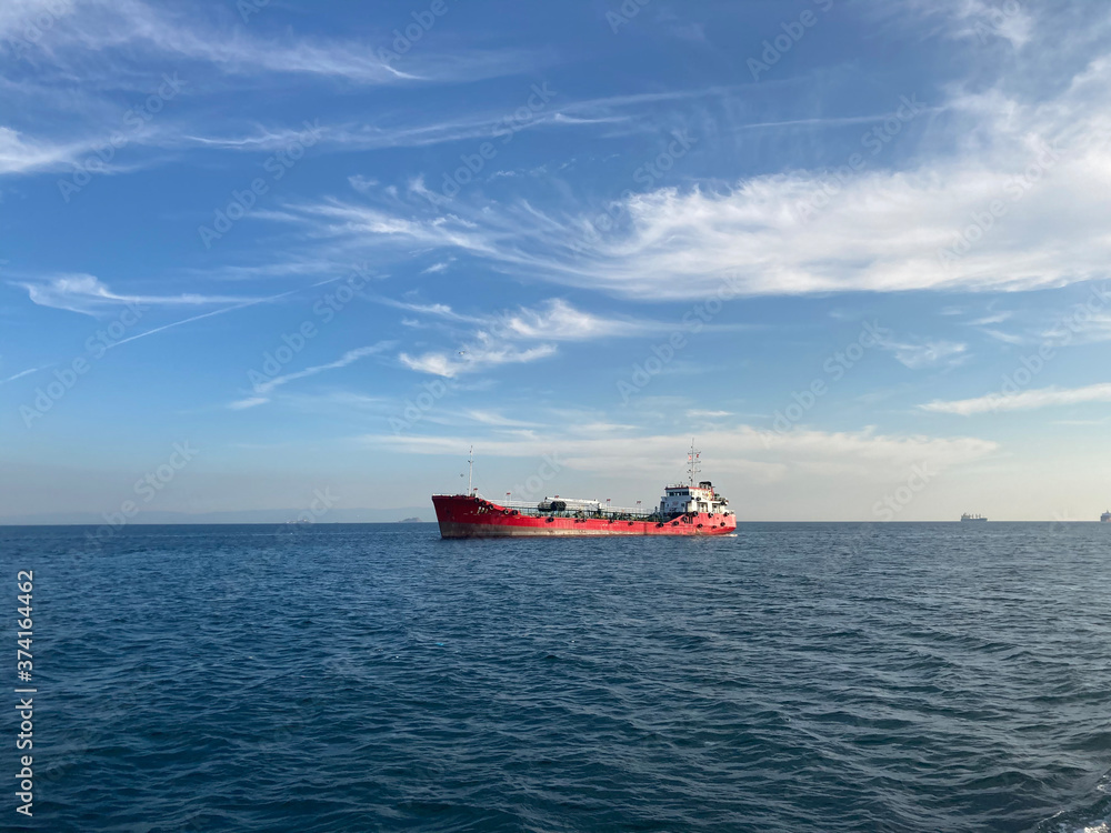 cargo ship on sea with amazing blue sky cargo ship on sea with amazing blue sky
