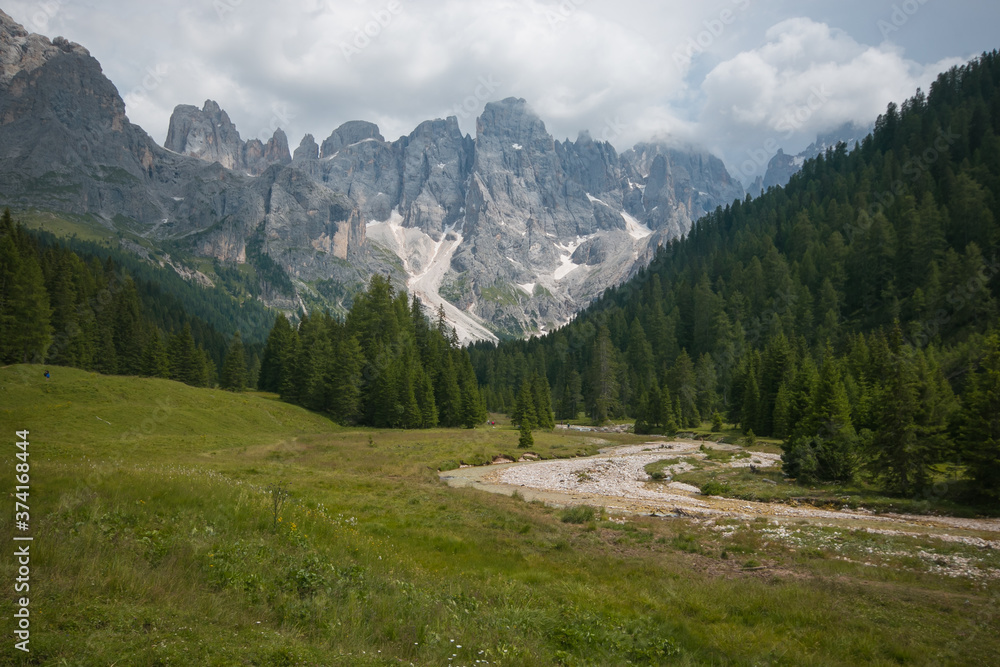 Beautiful view of Val Venegia on cloudy summer day in Trentino, Italy