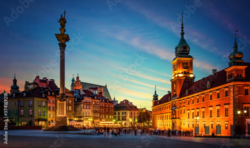 Evening view of the historic center of Warsaw. Panoramic view on Royal Castle, ancient townhouses and Sigismund's Column in Old town in Warsaw, Poland.
