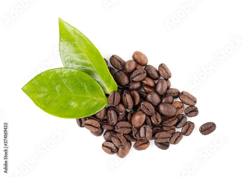 coffee beans and green leaves on a white background
