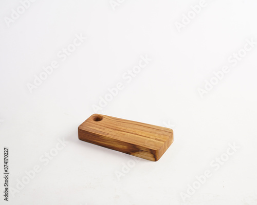 a cutting board made of used wood, commonly used for chopping bones, cutting meat.