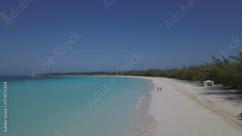 Wallpaper Mural Over white sand beach in the sunny morning with drone crystal clear clam water Bahamas island bay  Torontodigital.ca