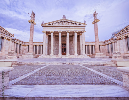 Tableau sur toile Athena and Apollo marble staues on ionic style columns and Athens academy front