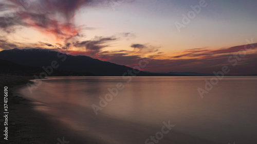 Sunset over the mountain in front of the sea  © Alex Top