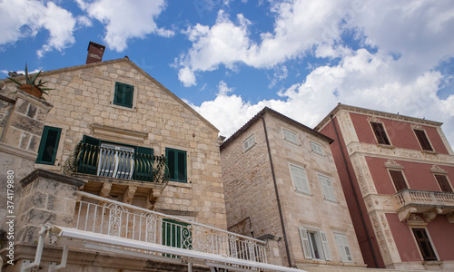 Beautiful, old, traditional houses of Hvar island, some of them constructed in various styles and colors, depending on the century they were built in