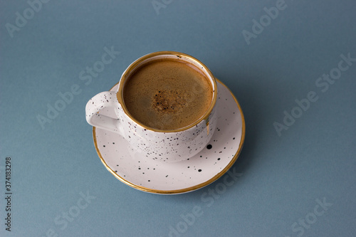 cup of coffee on blue background