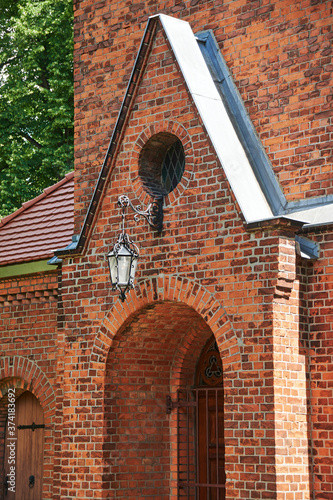 Building details of a medieval village church in Grossziethen, Germany. photo