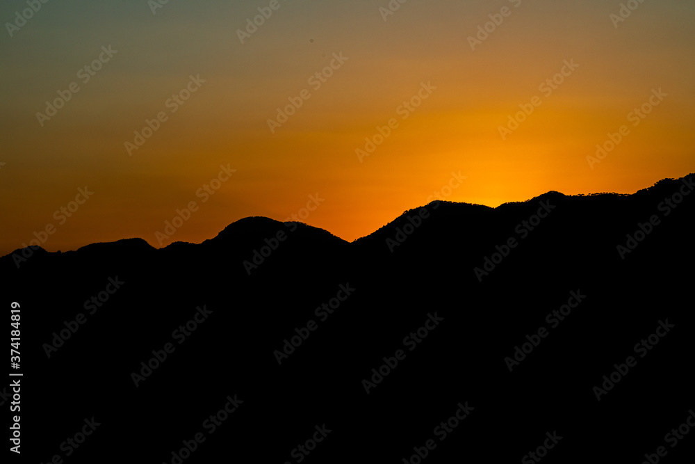 Sunset over the mountains in the Desierto de Palmas in Spain