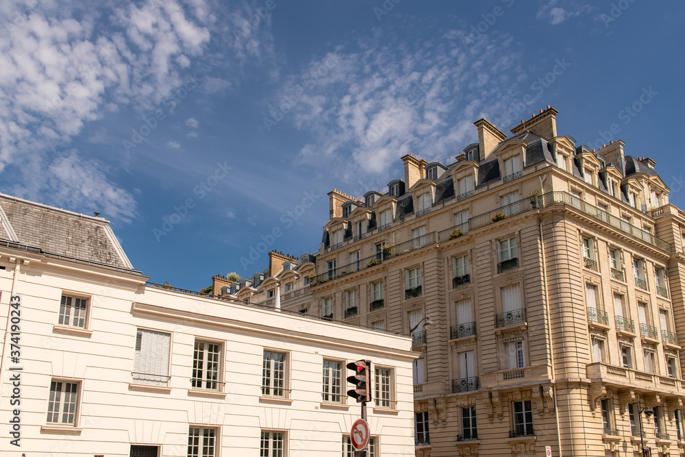 Fototapeta premium Paris, typical facades and street, beautiful ancient buildings boulevard des Invalides 