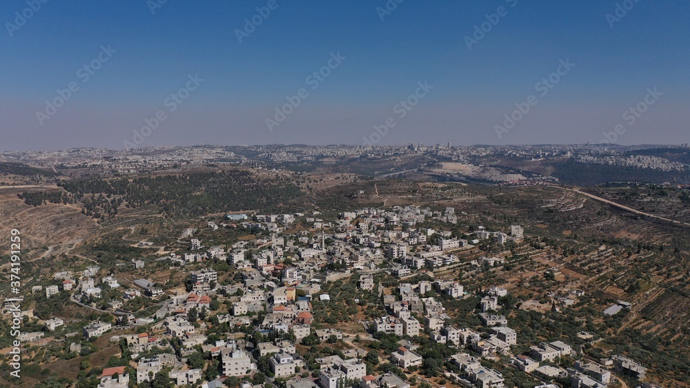 Palestinian Village Beit Surik with Jerusalem city in background
Aerial view, Mosque, Jerusalem,August,2020,Israel
