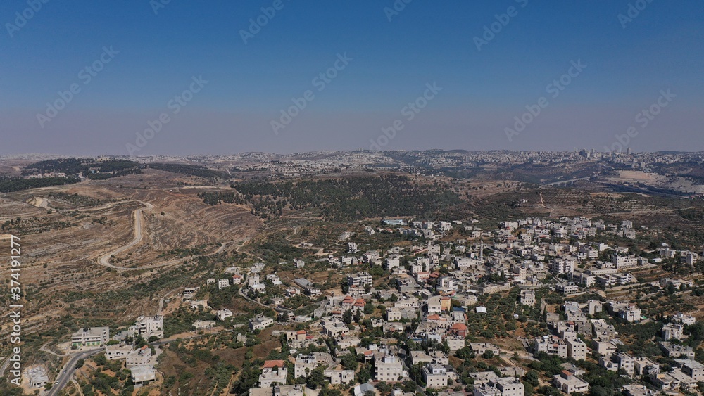 Palestinian Village Beit Surik with Jerusalem city in background
Aerial view, Mosque, Jerusalem,August,2020,Israel
