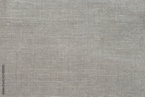 Texture of old fabric. Handmade linen textiles, a beautiful and relevant background.