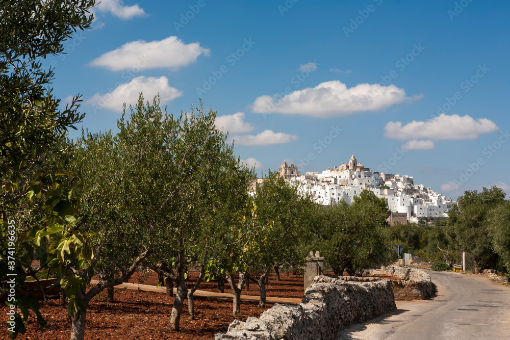 Landscape with blue sky and clouds: Ostuni, Landscape with blue sky and clouds: Ostuni,