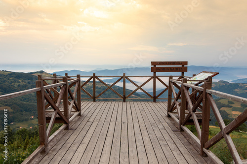 Podrinja  Serbia - July 17  2020  Spectacular summer sunrise in Serbia. Kapija Podrinja - Bajina Basta wooden viewpoint overlooking the mountains and the valley