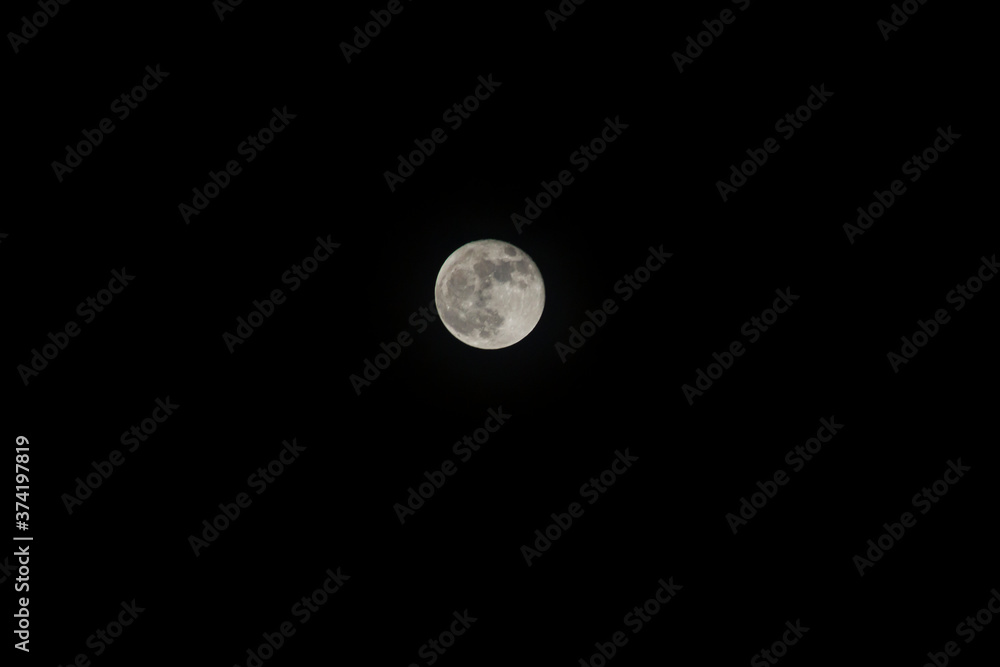Very detailed moon in the sky on black background Very detailed moon in the sky on black background