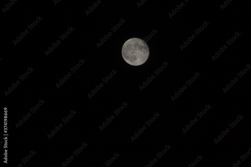 Very detailed moon in the sky on black background Very detailed moon in the sky on black background