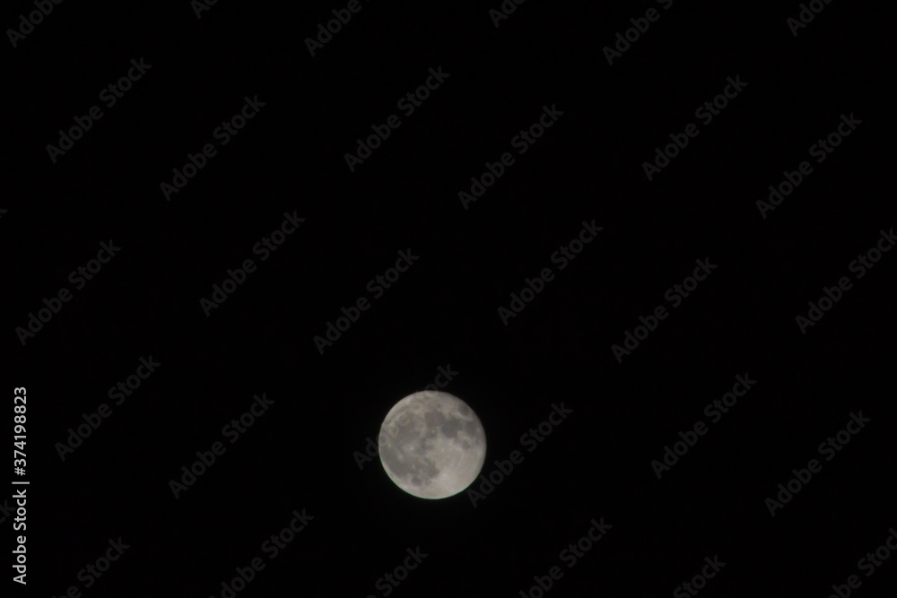 Very detailed moon in the sky on black background Very detailed moon in the sky on black background