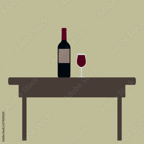 Bottle of wine and a glass on the table