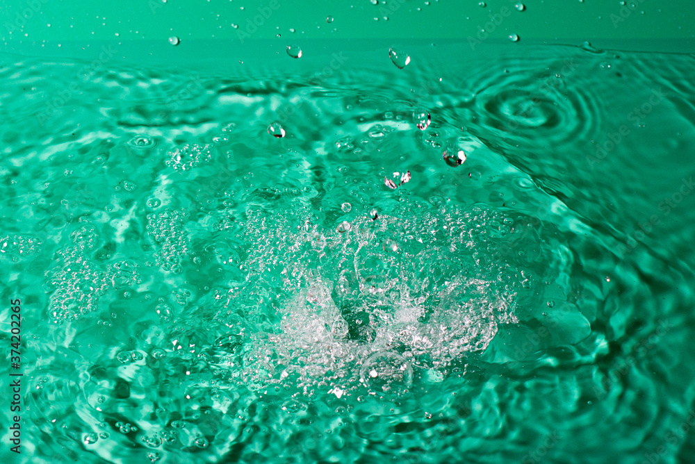 splash of water on black isolated background splash of water on black isolated background