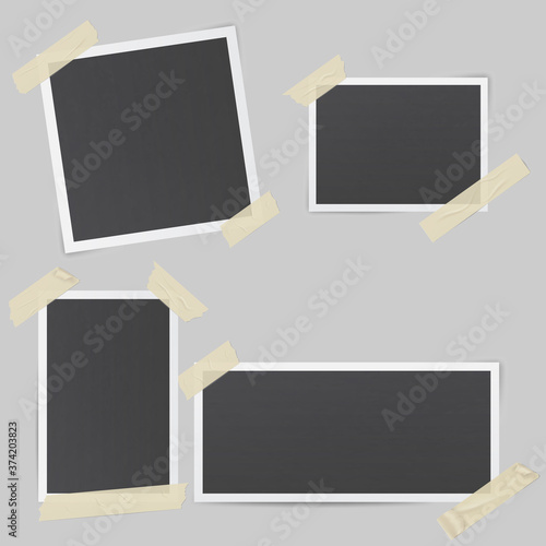 Black photo frames glued with transparent adhesive tape