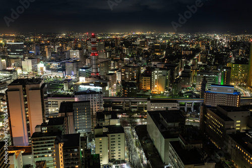 日本仙台市街の夜景 青のライトアップ合成COVID看板