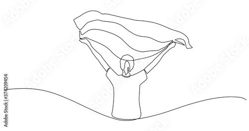 One continuous line drawing of a happy young woman celebrates victory holding a flag in her hands. Girls arms wide open holds LGBT flag on a street one line. Vector illustration