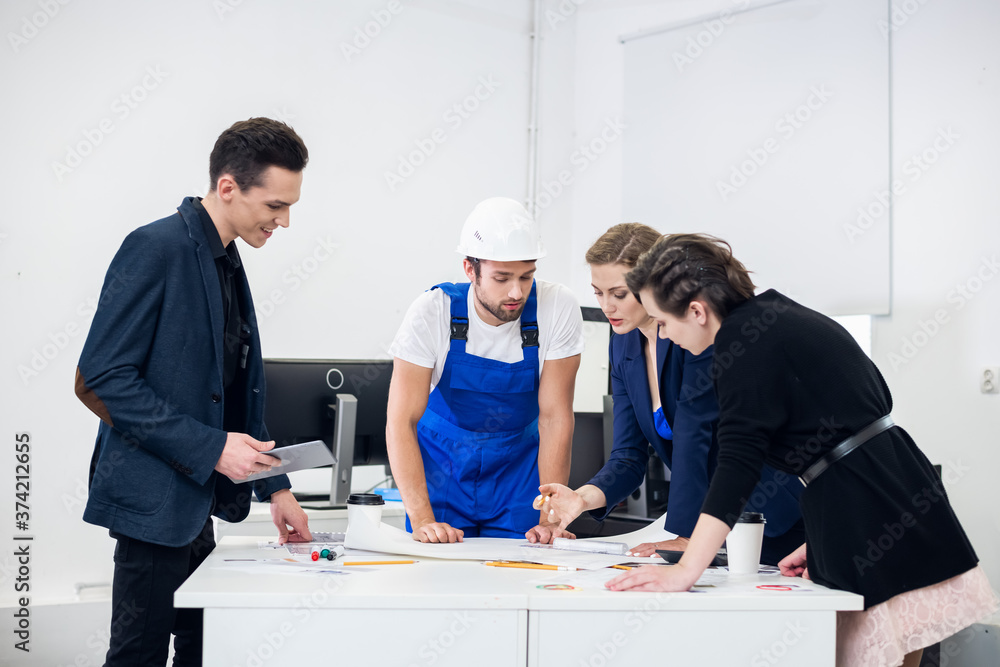 A Group Of Young Coworkers Making Great Business Decisions. Creative Team Discussion. Corporate Work Concept. Modern Office. Startup