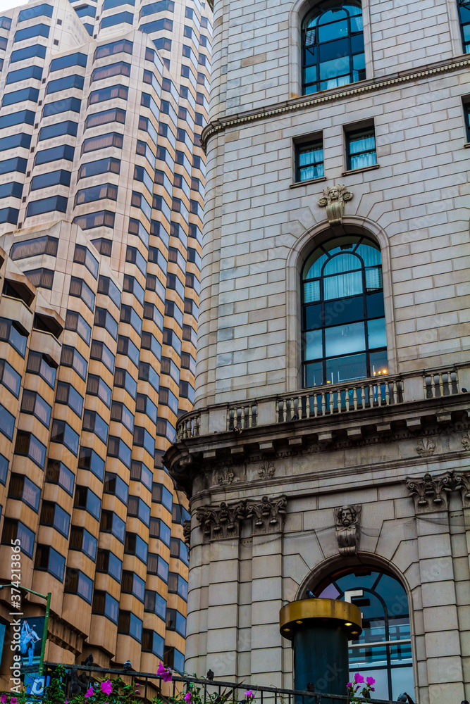 Fototapeta premium Tall Buildings With Contrasting Styles of Architecture Near Union Square, San Francisco, California, USA