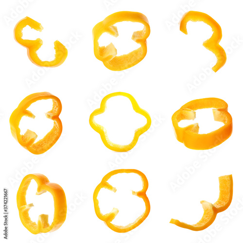 Set of yellow bell pepper slices isolated on white