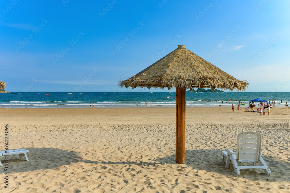 sun loungers and shelters on a beach sun loungers and shelters on a beach
