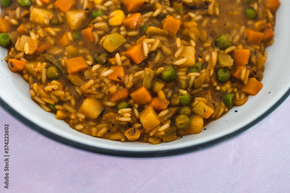 plant-based food, vegan stew with garden vegetables rice and cajun spices plant-based food, vegan stew with garden vegetables rice and cajun spices