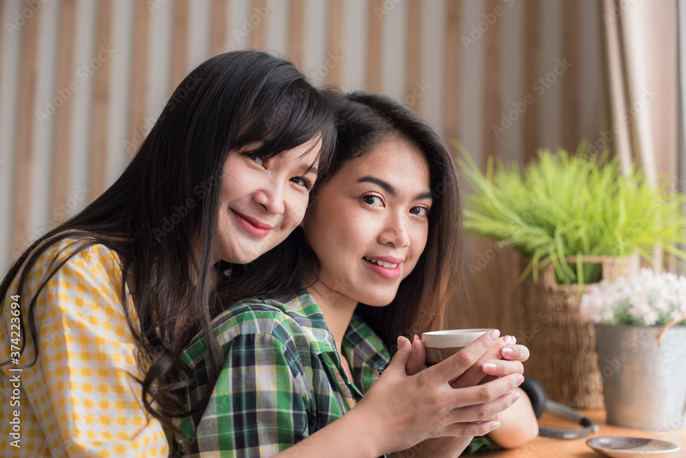 Two girl friends, best friends, are expressing their love for each other and being happy. Two girl friends, best friends, are expressing their love for each other and being happy.