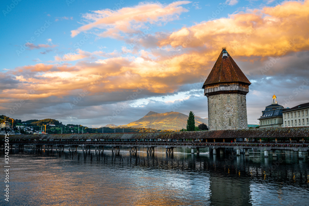 Sunset view in Lucerne with the Chapel bridge Rigi mount and colorful clouds in Lucerne old town Switzerland
