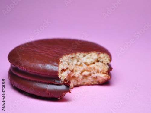 Choco Pie Chocolate isolated on pink background. Choco Pie coated snack