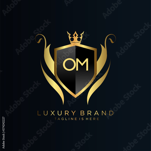 OM Letter Initial with Royal Template.elegant with crown logo vector, Creative Lettering Logo Vector Illustration.