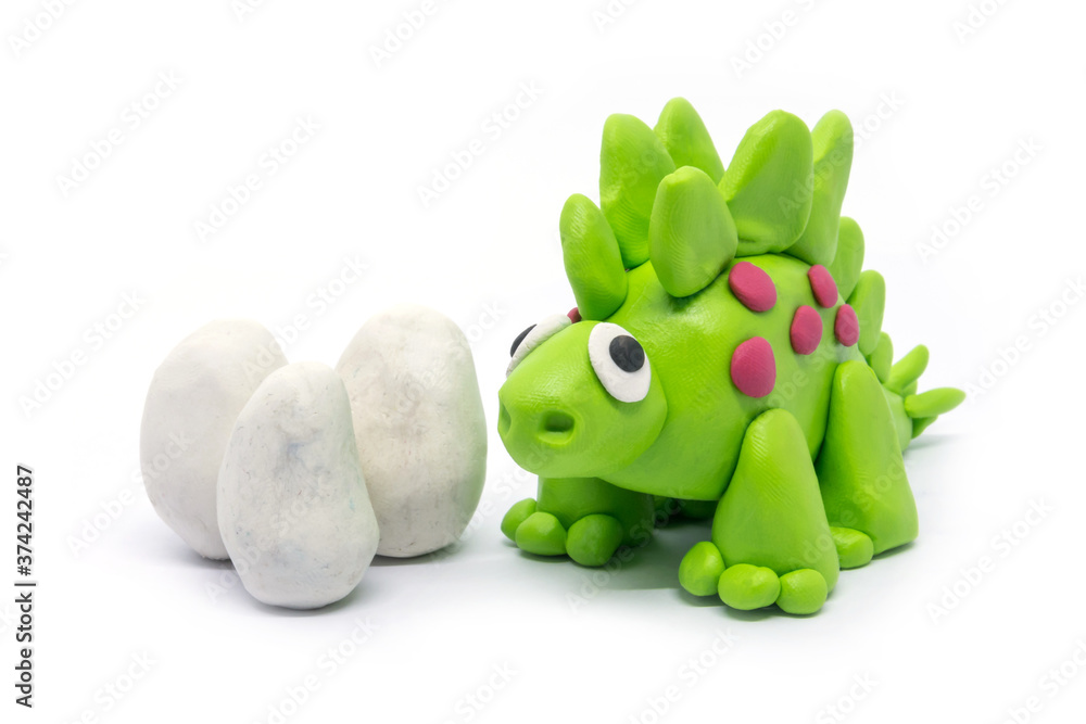Fotografie Play dough Stegosaurus on white background