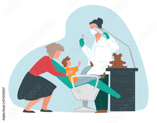 Kids dental care, mom helping scared kid to sit still
