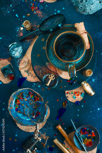 Astrology, astronomy concept with meteor, stars and scrolls on a starry night background
