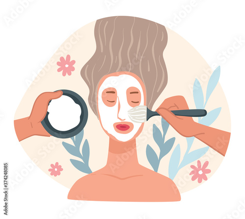 Beauty salon procedures and skincare, applying mask on face
