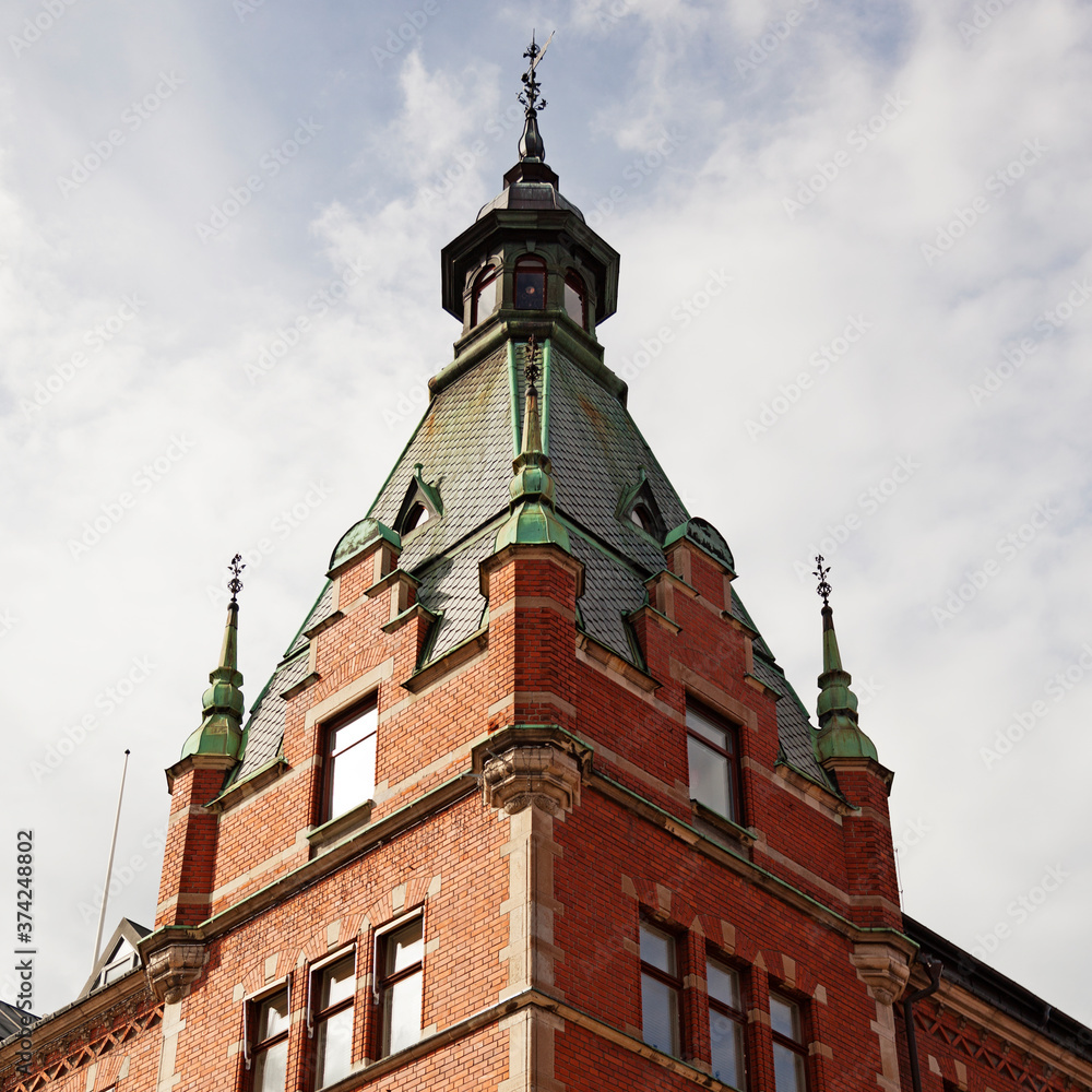 tower to an old red brick house in the center of Sundsvall