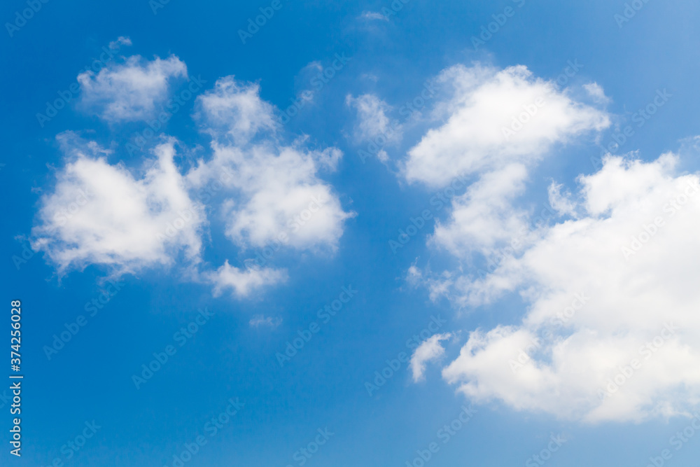 Blue sky with cumulus clouds at daytime Blue sky with cumulus clouds at daytime