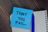Today You Fall write on sticky notes isolated on office desk.