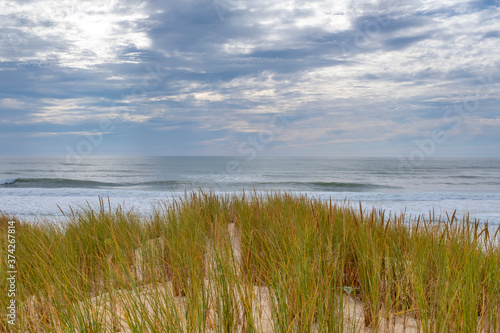 Ocean waves breaking on an empty French beach