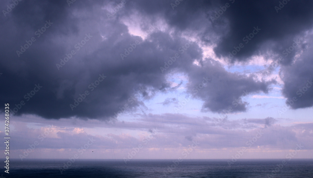 dark storm clouds over the sea